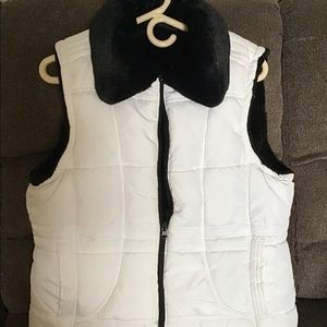 Puffy white vest fully lined in soft fur like the color